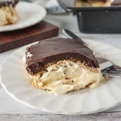 a piece of cake on a plate with a fork