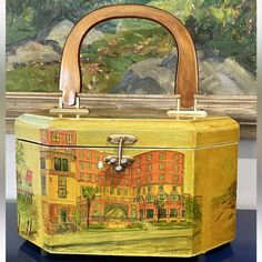 Floral Building Scenic Wood Box Purse Handbag Bag Pink Orange Green Vtg 60s 70s Vtg 1960s 1970s. Handmade Would Also Make A Cute Makeup Case. Design On All 4 Sides. Lucite Handle. Velvet Lining. Gold Hardware. Mirror On Inside Of Lid. No Fading, Stains, Rips, Tears, Or Holes. See Pictures For Additional Details Of Condition. Smoke Free Home. Measurements Are Approximate: Width - 9.75” (At Widest Part) Height - 5” (Not Including Handle) Depth - 7” (At Deepest Part) Vintage Box Bag With Detachable Handle, Retro Top Handle Box Bag For Shopping, Retro Top Handle Box Bag For Travel, Vintage Rectangular Box Bag For Travel, Vintage Rectangular Box Bag For Shopping, Retro Rectangular Case Bag For Gifts, Vintage Rectangular Box Bag For Gift, Vintage Pink Bags, Retro Rectangular Box Bag Gift