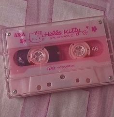 an old hello kitty cassette tape recorder with the words hello kitty on it