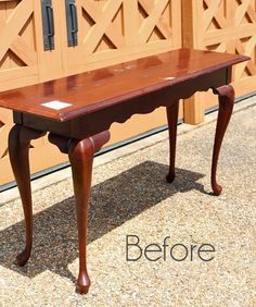 an old table is refinished with new paint and wax to look like it has been painted