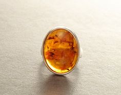 Boho Amber Ring Hipster Ring Silver Ring Sterling by KRAMIKE Modern Amber Oval Ring, Hipster Rings, Amber Ring, Amber Jewelry, Oval Stone, Boho Rings, Buying Jewelry, Ring Silver, Sterling Ring