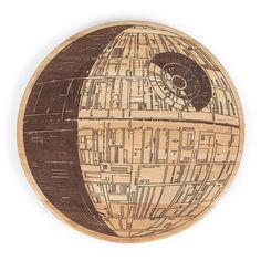 "The Star Wars Death Star Serving Board is perfect for cheese, bread, and appetizers. This durable parawood circular cutting board features a faithfully accurate depiction of the one-and-only Death Star and makes an explosively festive Star Wars addition to dinner parties, picnics, cocktail parties and any meal. The Star Wars Death Star Serving Board is perfect for cheese, bread, and appetizers. This durable parawood circular cutting board features a faithfully accurate depiction of the one-and- Han And Leia, Wooden Serving Boards, Dark Side Star Wars, Wood Cheese Board, Disney Gift, Picnic Time, Cheese Bread, Colour Star, Disney Merchandise