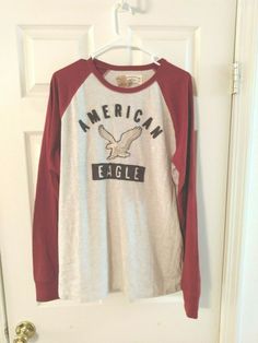 American Eagle Men Sz L NWT L/S Crewneck Lightweight Pullover Shirt Logo Brand New. Fall Streetwear Tops With Raglan Sleeve, Raglan Sleeve Tops For Fall Streetwear, Graphic Print Raglan Sleeve Winter Top, Winter Graphic Print Raglan Sleeve Tops, Relaxed Fit Long Sleeve Tops For College, Long Sleeve College T-shirt, American Eagle Men, Pullover Shirt, Active Wear Tops