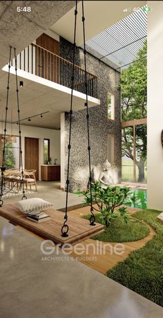 a living room filled with furniture next to a tree in the middle of a house