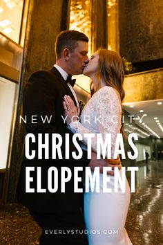 a man and woman kissing in front of a building with the words, new york city christmas