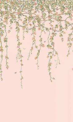 a pink wall with vines and flowers on it