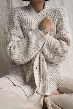 This is our Helga Cardigan. Designed to soften the challenges of everyday life, this cool and comfy knit has a chunky structure that is soft, loving and full of personality. Its weight will shape to the uniqueness of your body. The natural fibres make it a dream to wear. Perfect piece for Autumn and Winter to keep you warm but also perfect for the cool evenings of Summer and Spring. A great weight that just feels like you’re being held and hugged the whole time you wear it and it just falls on t Yoga Flare Pants, Sustainable Womens Clothing, Soft Knit Cardigan, Cardigan Design, Autumn Fits, Organic Cotton Yarn, Slow Fashion Brands, Organic Cotton Clothing, Natural Fibres