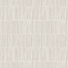 a white wallpaper with vertical lines on it