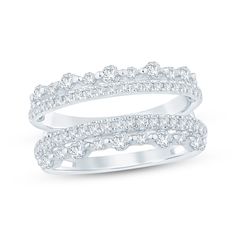 two white gold wedding bands with round diamonds on each band, set in 18k white gold