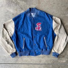 Vintage 70s 80s Denim Bomber Varsity Ole Miss Jacket. Excellent Condition. Made In Salem Indiana Usa 100% Cotton. Xxl Retro Cotton Varsity Jacket With Patchwork, Retro Cotton Varsity Jacket For Fall, Retro Cotton Outerwear For Streetwear, Retro Patchwork Varsity Jacket For Spring, Retro Spring Patchwork Varsity Jacket, Retro Cotton Varsity Jacket For Spring, Retro Denim Patchwork Outerwear, Vintage Patchwork Outerwear For Streetwear, Vintage Denim Blue Outerwear For Streetwear