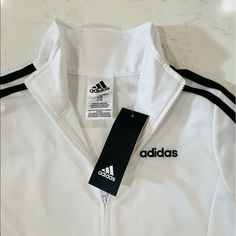 Nwt Girls Wire And Black Adidas 3 Stripe Jacket. This Jacket Is Size Large 14 But It Is Quite Small And I Would Not Recommend It For Someone That Size Or Someone Who Has Long Arms. My Sister Usually Wears A Size 12 And This Was Too Small For Her. Graphic Jackets, Adidas Activewear, Black Tracksuit, Adidas Three Stripes, Adidas Zip Up, Adidas Sweater, Adidas Windbreaker, Adidas Track Jacket, Tracksuit Jacket