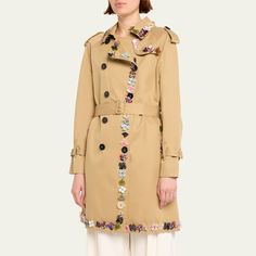 Libertine "Button Town" belted trench coat features multicolor buttons throughout the trim  Spread collar  Two-row button front  Long sleeves; belted shoulders and cuffs  Adjustable belted waist  Side slip pockets  Mid-length  Relaxed fit  Cotton Lining: Polyester Dry clean Made in USA Designer Spring Outerwear With Belted Cuffs, Wardrobe Sale, Evening Flats, Cocktail Jacket, Belted Trench Coat, Spring Wardrobe, Lingerie Sleepwear, Coat Dress, Designer Collection