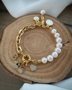 10 mm real freshwater pearl, gold-plated sailor clasp, sparkling baguette stone, specially produced pearl bracelet with letters Gold Beaded Pearl Charm Bracelet, Gold Charm Bracelet With Round Pearl Beads, Jewelry Evil Eye, Pearl Beaded Bracelet, Pearl Bracelet Gold, Bracelet Pearl, Bridesmaid Bracelet, Bracelet Vintage, Evil Eye Charm