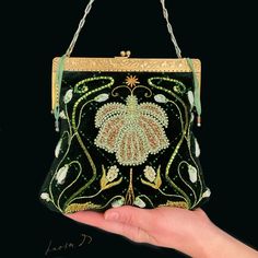 This bag is hand-embroidered. Inspired by the flourishing motifs of this old clasp to which I gave "second life". Very elegant, "eventful", this bag will bring you the real aesthetic pleasure. Unique in the world. Its charm add the ancient pearls with which I embroidered some elements. Vintage Green Shoulder Bag For Party, Green Vintage Shoulder Bag For Party, Antique Gold Embroidered Bags, Victorian Gold Bag As Gift, Elegant Green Beaded Shoulder Bag, Vintage Handmade Bags For Gifts, Handmade Vintage Bag As Gift, Antique Embroidered Evening Bags, Vintage Handwork Evening Bag For Wedding