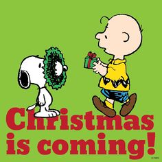 a charlie brown christmas is coming with the peanuts holding a wreath and giving it to his friend