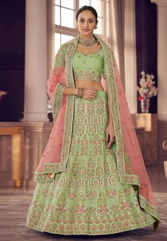 Pista green organza a line lehenga choli 9422  Desc:  Style : A Line Lehenga Choli Color : Pista Green Fabric : Organza Work : Heavy Embroidery Wash Care : Dry clean Sleeve Style : Half Sleeve Long Sleeves : Done only in Custom Stitch Sleeves Lining : Done only in Custom Stitch Bust Size : 32 to 42 Inches Occasion : Wedding   Mehendi   Sangeet   Engagement   Reception   Ceremonial   Baby Shower. With Express Free Shipping and Custom Stitching, Buy Indian Party wedding wear Bridal Lehenga Choli P Organza Choli, A Line Lehenga, Green Lehenga Choli, Organza Bridal, Indian Wedding Lehenga, Choli Dress, Organza Lehenga, Green Lehenga, Organza Wedding