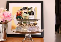 My cake stand perfume display. :) Diy Perfume Display, File Box Organization, Perfume Collection Display, Pretty Cake Stands, I Heart Organizing, Perfume Display, Hanging Shoe Organizer, Makeup Drawer Organization, Diy Perfume