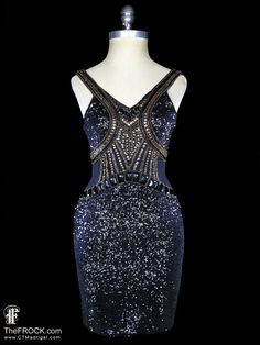 "BIG NEWS After 22 years, our website, TheFROCK.com, has had a makeover. Check out the new site, and join our mailing list for new arrivals.  VERSACE black and gold beaded stretch dress. Fully lined in a shiny black jersey. Rear zipper. Condition is excellent with only discreet wear to cabachon finishes. The fabrics have some stretch to the dress will fit many sizes; bust will stretch from 30\" to 34\", the waist stretches from 25\" to 28\", the hips stretch from 31\" to 37\", and the length is Embellished Black Bodycon Dress For Prom, Black Embellished Bodycon Dress For Prom, Sleeveless Sequin Bodycon Evening Dress, Glamorous Bodycon Bandage Dress For Prom, Glamorous Bandage Dress For Prom And Party Season, Glamorous Bandage Dress For Prom, Sleeveless Bodycon Dress For Gala Party Season, Embellished Fitted Bodycon Evening Dress, Fitted Embellished Bodycon Evening Dress