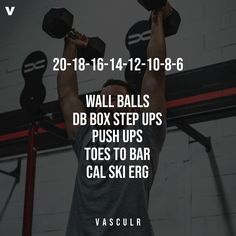 a man lifting two dumbbells in front of a white brick wall with the words wall balls dub box step ups push ups toes to bar cal ski erg