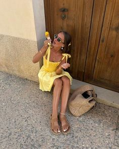 European Summer Outfit Ideas | Outfit Inspo for European Holidays | What to wear in summer ideas #summer #outfitinspo Mallorca Aesthetic Outfit, Sicily Outfits, Mallorca Outfit, Light Yellow Dresses, Short Yellow Dress, Chica Chola, Bright Yellow Dress, Dinner Outfit Casual, Stile Hijab