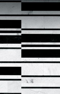 a black and white striped wallpaper pattern with vertical lines in the center, on top of each other