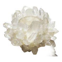 a large cluster of crystals sitting on top of a table