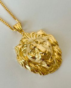 The Gold Lion Pendant Necklace is handmade, vintage inspired by the iconic lion's head door knockers in Paris.  The pendant is 18K gold plated silver, on gold filled box chain, 1.5 mm thick. All items come in a gift box ready to gift. To see more please visit  https://www.etsy.com/shop/BijouLimon Bijou Limon jewelry collections present a romantic French spin on the latest jewelry trends. Based on the US West Coast but French at heart, Bijou Limon interprets the current jewelry trends and deliver Luxury Yellow Necklaces For Gift, Luxury Gold Mythological Style Necklaces, Luxury Gold Zodiac Jewelry, Leo Mathild Jewelry, Luxury Yellow Gold Custom Necklace, Luxury Gold Mythological Necklaces, Luxury Yellow Gold Jewelry With Logo Charm, Luxury Yellow Gold Symbolic Necklace, Luxury Yellow Gold Necklaces For Anniversary Gift