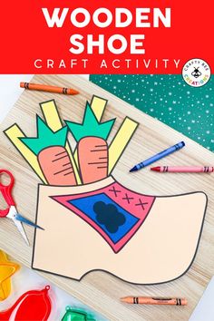 the wooden shoe craft activity is shown with scissors and crayons