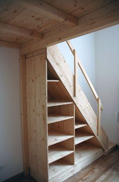 the stairs are made out of wood and have no railings