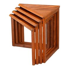 three wooden tables stacked on top of each other