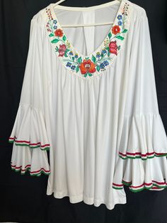 Hand painted white top / tunic Hungarian Kalocsa design  The sleeves bottom got  red-white -green hand embroidered lace Size XXL White Folk Style V-neck Blouse, White Tunic Blouse For Festival, Green Blouse With Embroidered Sleeves For Spring, White Bohemian Embroidered Tunic Top, Bohemian White Embroidered Tunic Top, White V-neck Peasant Top With Floral Embroidery, Summer Tunic With Embroidered Sleeves, White Tunic Tops For Festival, Bohemian White Peasant Top With Embroidered Sleeves