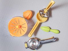 an assortment of kitchen utensils on a table