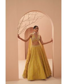 Shop for the perfect bridal party Lehenga at Parul Gandhi. This Yellow lehenga with intricate hand embroidery work and detailing is crafted with the finest materials for a royal look on your special day. Made to Order Indian Wedding Bride Dress and Custom Made Indian bridal Lehenga (Bay Area) Online Shipping Worldwide to UK, Germany, USA, Australia, Canada. Party Lehenga, Indian Bridal Couture, Wedding Bride Dress, Hand Embroidery Work, Bridal Lengha, Indian Wedding Bride, Simple Lehenga, Yellow Lehenga, Choli Blouse