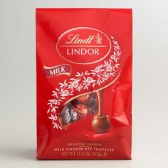 lindt lindor milk chocolate bar in red packaging