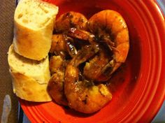 a plate with bread and shrimp on it