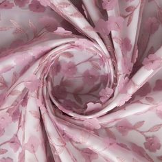 pink and white fabric with flowers on it