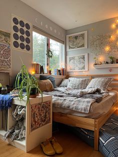 a bed room with a neatly made bed next to a window