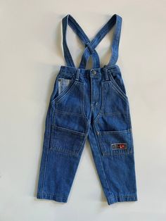 Vintage Light Wash Denim Jeans with Suspender Straps Carpenter Pockets and Plaid Pocket Details by Little Rebels Basics Toddler Denim 3T These are so incredible! They are still crisp, like new condition. The brand is Little Rebels Basics and they are tagged 3T, but they look long enough fir a 4T. They have a snap button and zipper and all the pocket details are so great! Love the built-in suspender straps! So great for boy or girl. Suspender Jeans, Light Wash Denim Jeans, Kids Overalls, 90s Jeans, Jean Pockets, 90s Denim, Boys Denim, Carpenter Jeans, Light Wash Denim