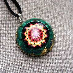 Malachite Flower Of Life EMF Protection Orgonite Necklace – Gofaer Crystal Orgonite store! Symbolic Green Round Pendant Jewelry, Spiritual Green Round Jewelry, Green Necklace With Round Pendant For Healing, Green Locket Necklace With Round Pendant, Green Locket Jewelry For Gift, Green Flower Pendant Necklace As Gift, Green Flower Pendant Necklace For Gift, Green Amulet Jewelry As A Gift, Green Symbolic Pendant Necklace