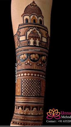 a woman's arm with an intricate design on it