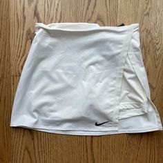 Brand New Slim Fit/Dri-Fit Tennis Skirt Nike Fitted Skirt, Nike Fitted Mini Skort, Nike Fitted Mini Skirt, Nike Mini Skort, Nike Pleated Skirt For Spring, Fitted Nike Skirt, Nike Fitted Pleated Skirt, Nike Stretch Lined Skirt, Nike Stretch Lined Skirt Bottoms