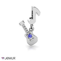 a musical note charm with a blue crystal guitar