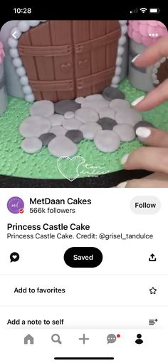 someone is decorating a cake on their cell phone