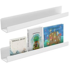 three white bookshelves with children's books on them