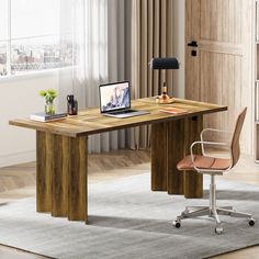 an office desk with a laptop on it and a chair in front of the desk