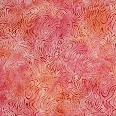 an orange and pink background with swirls on it's surface in shades of red