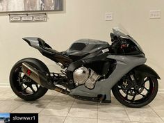 a motorcycle is parked in a showroom