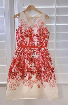 Carolina Herrera Orange/red Floral Silk Midi Dress Designer Red Summer Dresses, Designer Red Dresses For Summer, Designer Silk A-line Dress, Designer Red Party Dress, Luxury Sleeveless Red Dress, Luxury Red Cocktail Dress, Designer Red Silk Dress, Designer Red Fitted Dress, Designer Fitted Red Dress