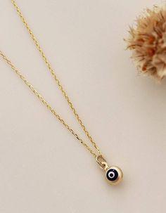 "14k Solid Gold Evil Eye Necklace - 14k Gold Nazar Necklace - Tiny Evil Eye Pendant - Fine Jewelry - Birthday Gift The Solid Gold Evil Eye Necklace \"Protection\" for Women is composed of high-quality 14 Karat Gold. The evil eye figure is the most preferred amulet for eliminating bad energy. Destroying the effects of bad looks, it offers a simple yet beautiful detail on your neck. 🔳WARRANTY🔳 *6 Months warranty. *Free Shipping without price limit. *Easy Return and Replacement 30 days after purc 14k Yellow Gold Evil Eye Necklace, 14k Yellow Gold Evil Eye Charm Necklace, 14k Gold Evil Eye Necklace, 14k Gold Evil Eye Round Necklace, 14k Gold Evil Eye Charm Necklace, 14k Gold Charm Necklace With Evil Eye, 14k Gold Round Evil Eye Charm Necklace, Nazar Jewelry, Nazar Necklace