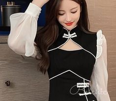 ❤Chiffon sleeve docking cheongsam dress❤Unit (cm)

 S.
 Length 76 Shoulder Width 36 Sleeve Length 55 Chest 88 Waist 64
 M.
 Length 77 Shoulder Width 37 Sleeve Length 55.5 Chest 90 Waist 68
 L.
 Length 78 Shoulder Width 38 Sleeve Length 56 Chest 92 Waist 72
 XL
 Length 79 Shoulder Width 39 Sleeve Length 56.5 Chest 94 Waist 76 Elegant Black Cheongsam For Spring, Black Stand Collar Evening Dress, Black Evening Dress With Stand Collar, Elegant Ao Dai With Stand Collar For Party, Elegant Long Sleeve Cheongsam For Evening, Elegant Long Sleeve Spring Cheongsam, Elegant Long Sleeve Evening Cheongsam, Chic Black Dress With Stand Collar, Elegant Long Sleeve Cheongsam